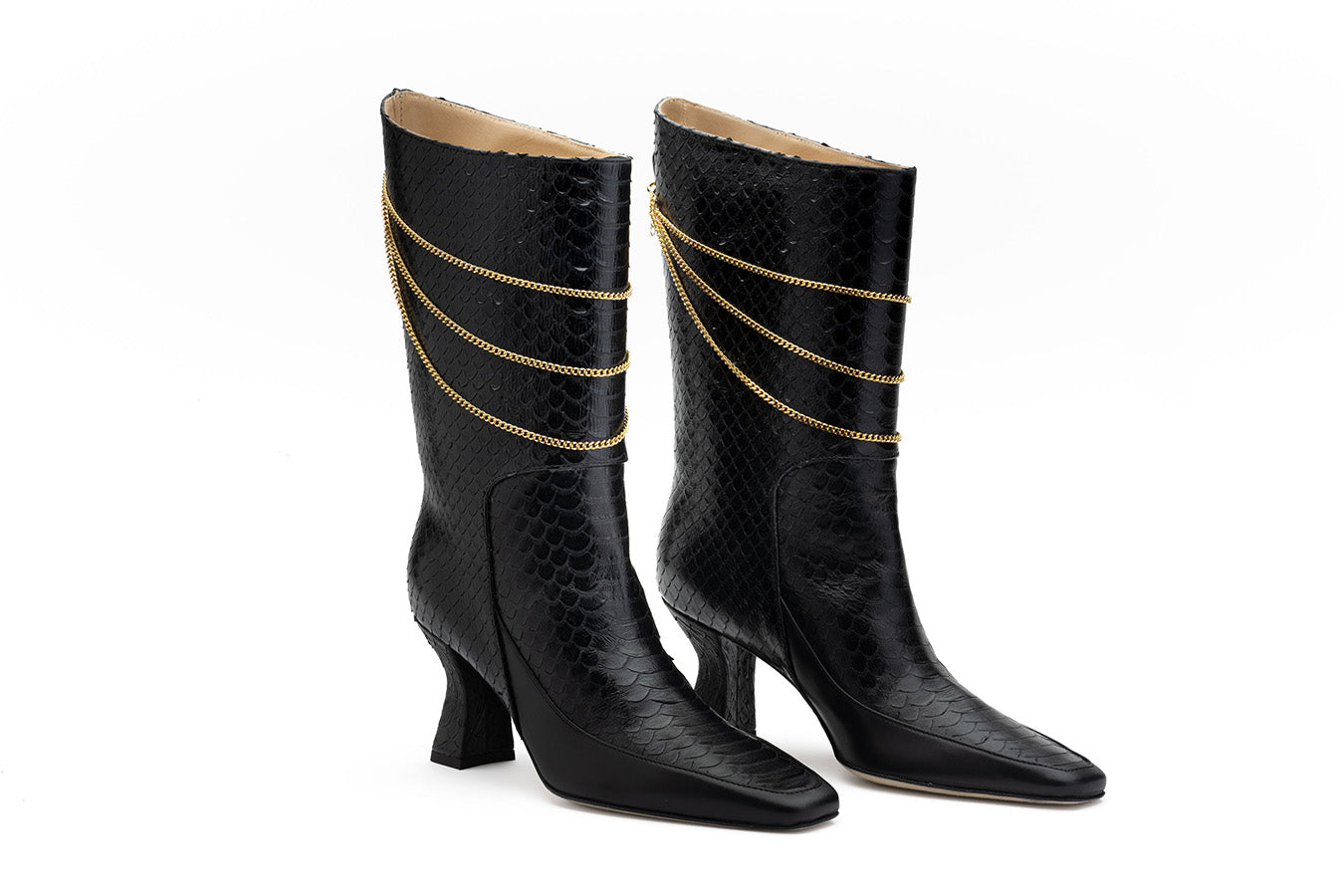Calf high black boots Femme Liberee Naomi Black Python Print Boot shot at an angle from the front on white background