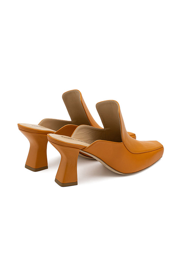 Women Mule Shoes on a white background in brown color (Shot from the back)