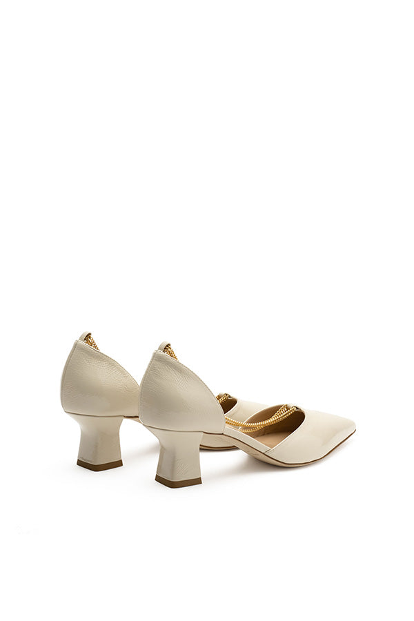 white leather shoes women Linda Pearl White Lack D'orsay shot at angle from behind on white background