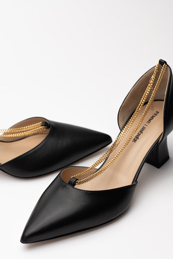 Elegant shoes for ladies Linda Black D'orsay in opposite directions shot at angle from above on whiite background