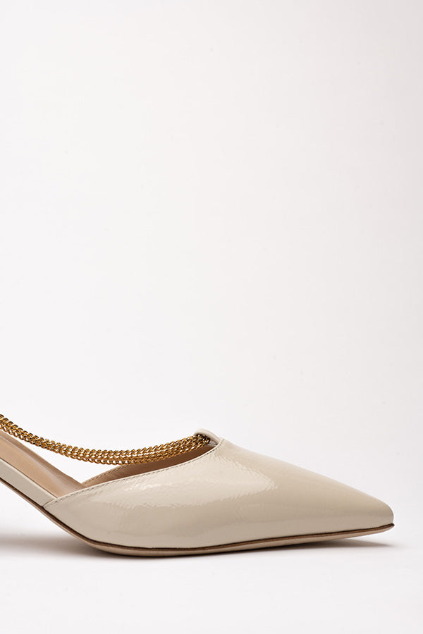 The sole of Linda Pearl White Lack Dorsay shoe shot from the side