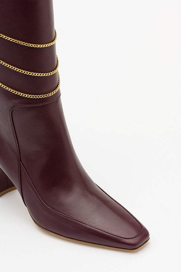 Naomi Mulberry Boot shot from the front at an angle on white background