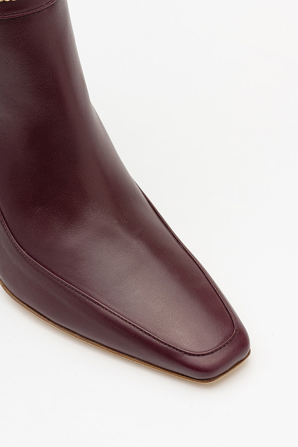 Naomi Mulberry Boot shot from above at an angle on white background