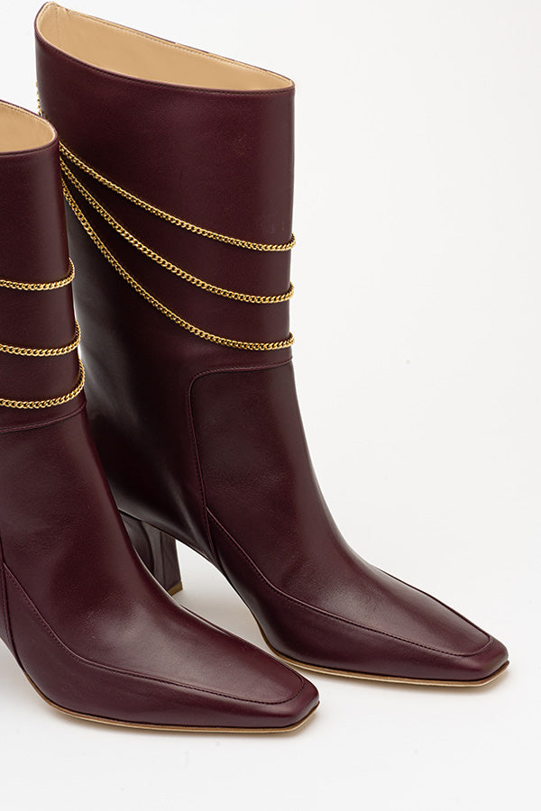 Naomi Mulberry black boots for women shot from the front at an angle on white background