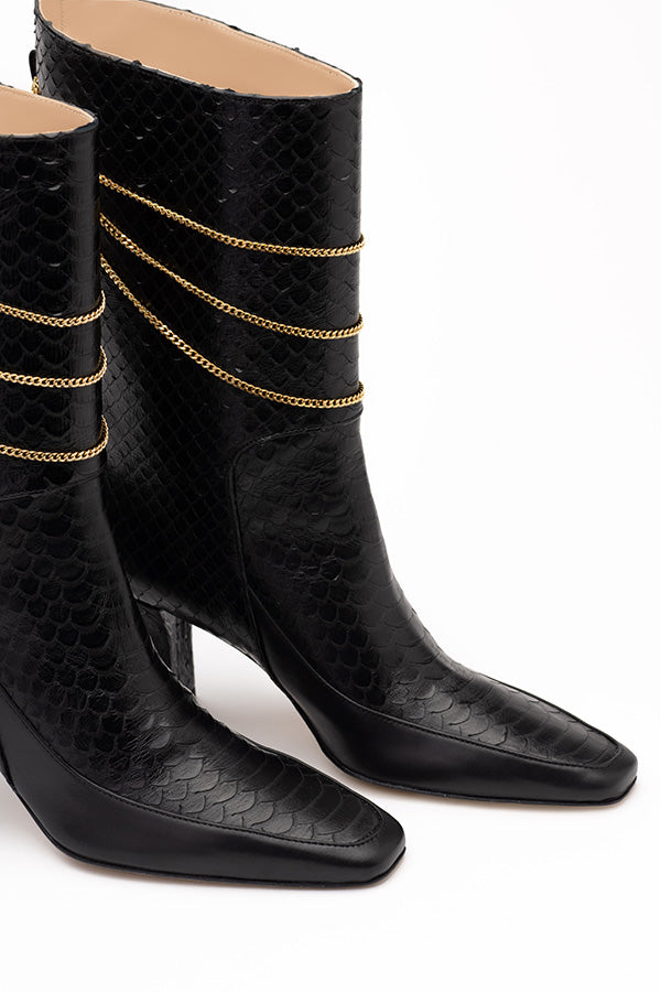 Leather black boots Naomi Black Python Print Boot shot at angle from the front on white background