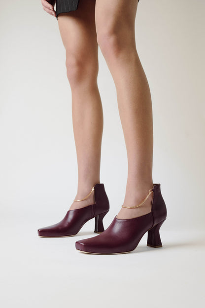 Woman legs with Kate Mulberry ShoeBoot