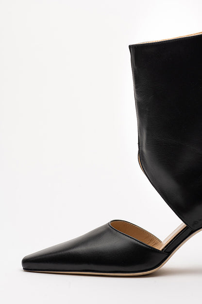 The sole of Tyra Black ankle boots shot from the side on white background